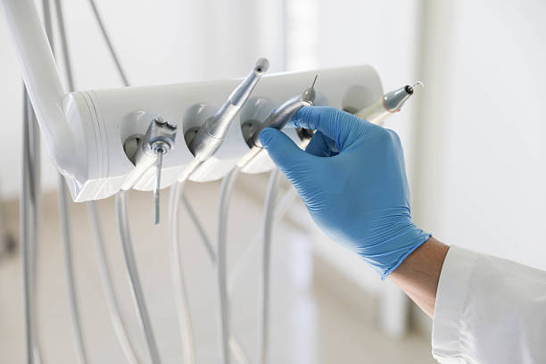 Professional Root Canal Treatment technician working in Helena, OK